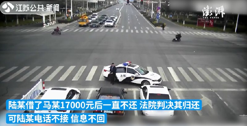16. 老赖不接电话不回信息 法院执行局路口堵截让其还款近日，江苏南通
